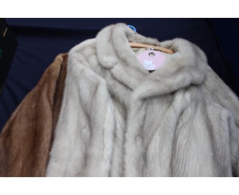 A light brown 3/4 length mink fur coat, single breasted with 3 buttons, lining in fair condition, together with a blue grey m