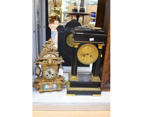 A 19th Century ebonised mantel clock and a French gilt metal and porcelain mantel clock (2) 