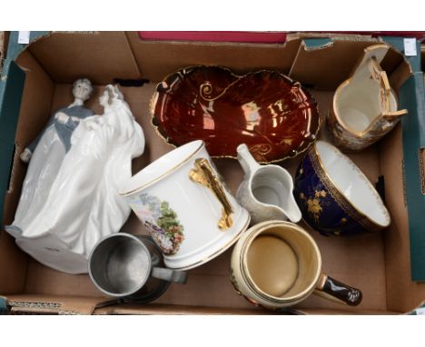 ***NEW GUIDE PRICE £40-£60***A box of ceramics to include Nao figure, Rouge Royale dish, tankards, etc 