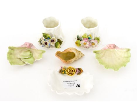 Royal Worcester shell moulded dishes and miniature vase, a pair of florally encrusted stump vases and a pin dish, various puc