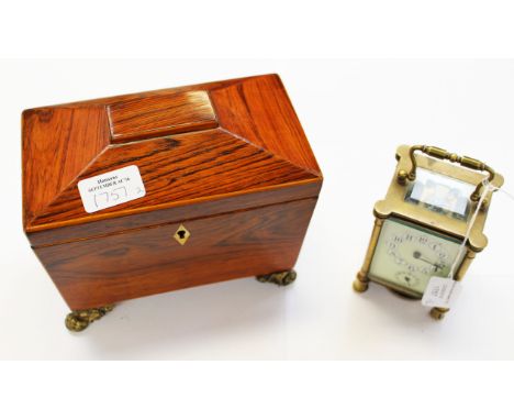 An early twentieth century carriage clock, enamelled face and dial, black Arabic numerals within white circles together with 