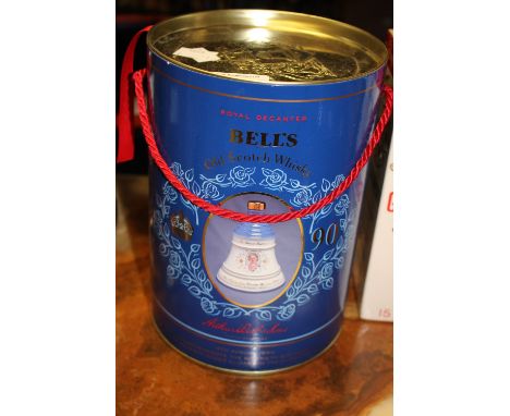 A boxed Bells Commemorative Whisky decanter; Queen Elizabeth The Queen Mother on her 90th birthday, 4th August 1990  