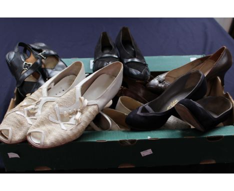 An assortment of shoes, to include: a pair of early 1950s beige flat peep toe shoes; a pair of perspex stiletto shows with de