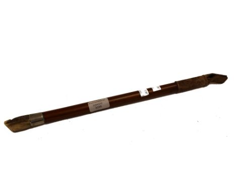 A small riding crop with horn whistle finial