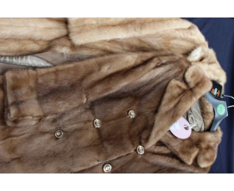 A long, double breasted light brown mink jacket together with a 1970s mink coat with suede panels (2)