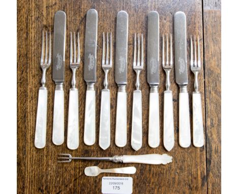 A group of eleven tea knives and forks with mother-of-pearl handles, the five knives having silver ferrules, maker Thomas Lev