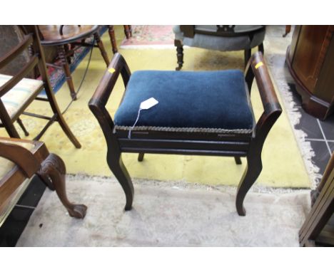 Edwardian piano stool having a lidded seat.