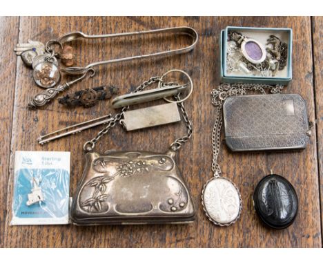 A silver engine turned match striker, with silver nips, other assorted silver, weighing approx. 2.75 ozt together with a whit
