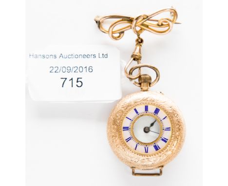 A ladies' 14 ct gold and enamel fob watch (adapted)