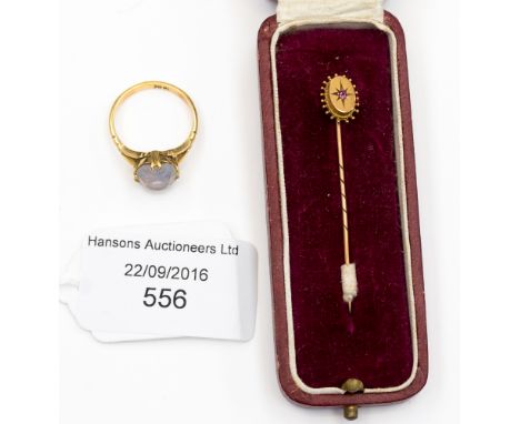 A 18 ct yellow gold ring set with faceted gemstones, gross weight 3.7 grms approx., ring size M, together with a late Victori