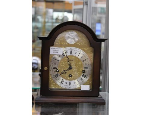 A German Hermle bracket clock, brass arched dial, silvered chapter ring