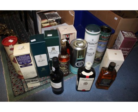 A collection of whisky and wine including Ballantine, House of Lords, Royal Challenge, Te Bheag Uisge Beatha, Bruichladdich 1