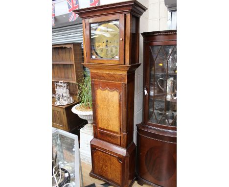 A George III oak and mahogany crossbanded longcase clock, circular brass dial, Arabic and Roman numerals
