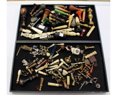 Two trays of assorted wax seals, 19th century and later, to include agate handled seals, bone seals, all metal seals, mother 