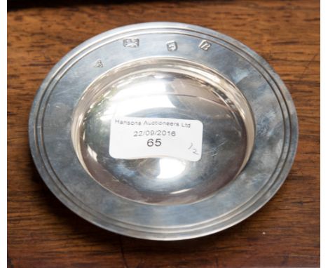 An Elizabeth II silver Armada dish, hallmarked Garrard and Co Ltd, London 1976 with leaflet,
weight approx. 95.6 grms / 3.07 