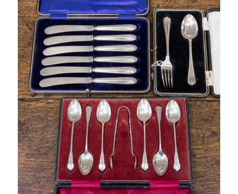   Boxed sets of EPNS spoons and tongs, child's EPNS spoon and fork, silver filled tea knife handles, boxed set