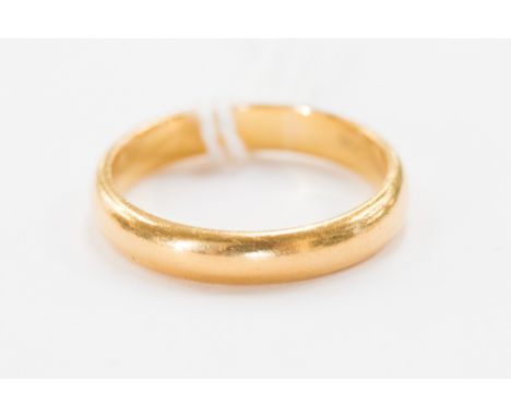 A 22 ct. gold wedding band, approx. 5.6 grms, size R 