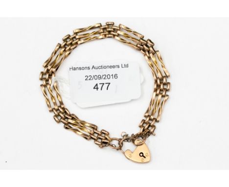 A 9 ct gold gate bracelet weighing approx. 10.2 grms 