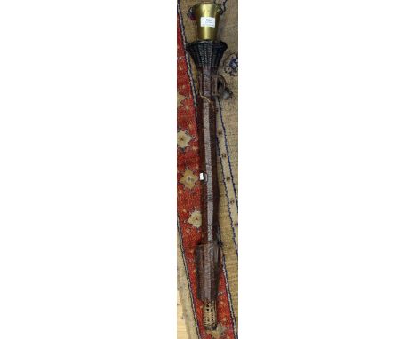 A brass hunting horn, with leather covered water carrier, horn inscribed D. Almaine & Co London