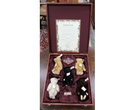 A Steiff UK baby teddy bears set, 1989-1993, five bears in wooden box, with certificate