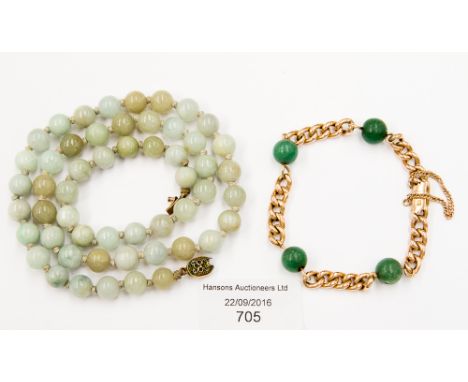 A 15 ct gold curb-link bracelet, with four jade beads, approx. 16.2grms together with a jade necklace, approx. 65 grms (2)