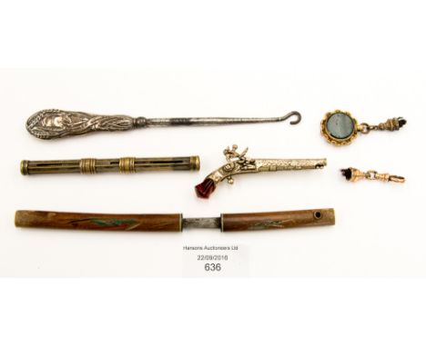 A steel button hook with filled silver handle, Birmingham 1907, a silver plated propelling pencil and pen combination, a roll