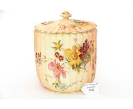 A Royal Worcester blush ivory biscuit barrel, painted with flowers on a ribbed drum body