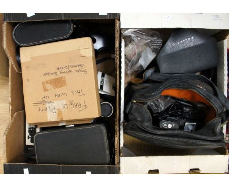 Two boxes of camera equipment, including Praktica, Polaroid, binoculars etc