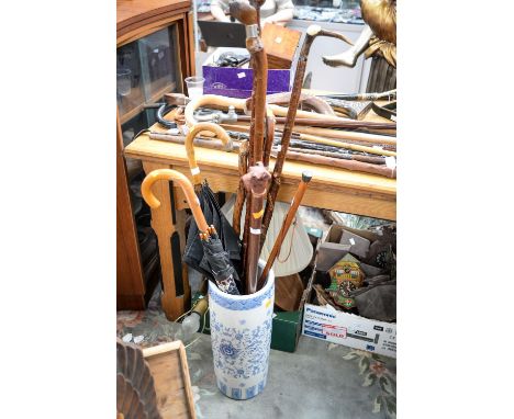 Walking sticks and umbrellas, including silver mounted sticks, plus a ceramic stand (11)