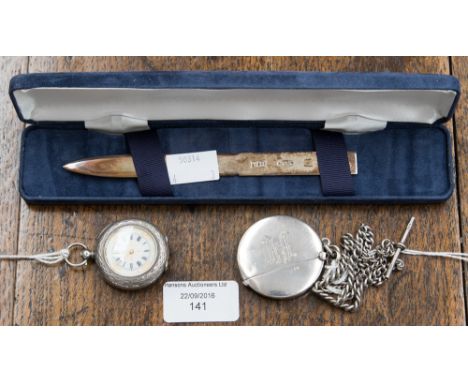 A silver match striker and chain, weighing approx 1.4 ozt, with a boxed silver letter opener, weighing approx. 0.82 ozt and a