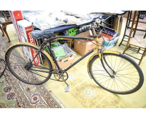 A Wulfruna bicycle, having three speed gear box, fitted with a leather seat, circa 1960 