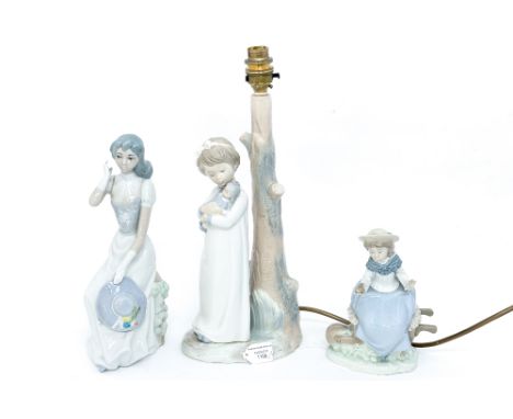 A collection of three Spanish figures comprising one lamp base, a Nao figure and another (3)