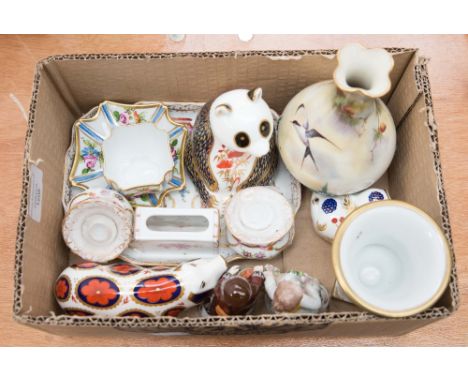 A box of ceramics including a Hadleys Worcester vase, painted with birds, Royal Crown Derby paperweights, figurines etc