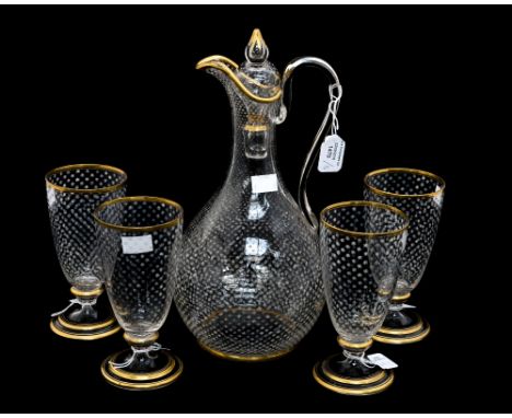 A 19th Century French glass decanter, etched with stars, gilt lined, together with four glasses (5)