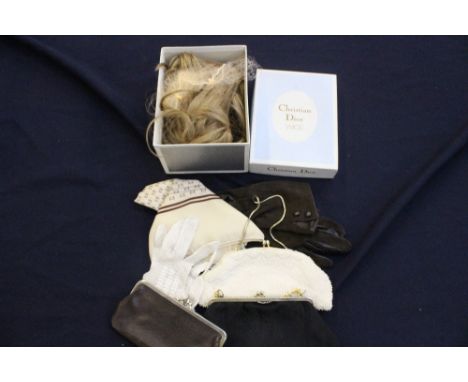A boxed Christian Dior wig dating from 1970s, dark blonde and short style in original box, together with dark brown gloves, i