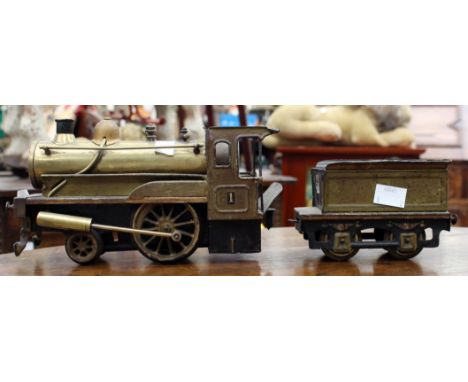 A brass steam engine with coal truck (2) 