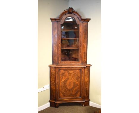 Georgian style mahogany crossbanded and inlaid walnut two section standing corner cabinet, the upper section having an arch s