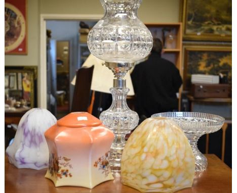 Cut glass table lamp, three coloured glass lamp shades etc   Condition: 