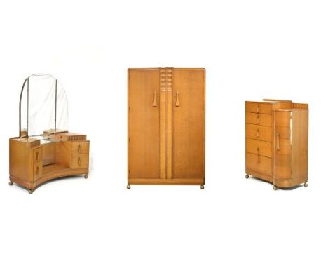 Art Deco oak three piece bedroom suite comprising: two door wardrobe, drop-centre dressing table fitted triple mirror and fou