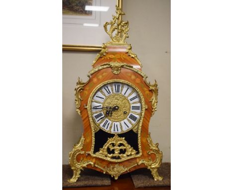 Reproduction French style mantel clock in a gilt metal mounted floral marquetry style case, the dial with Roman numerals   Co