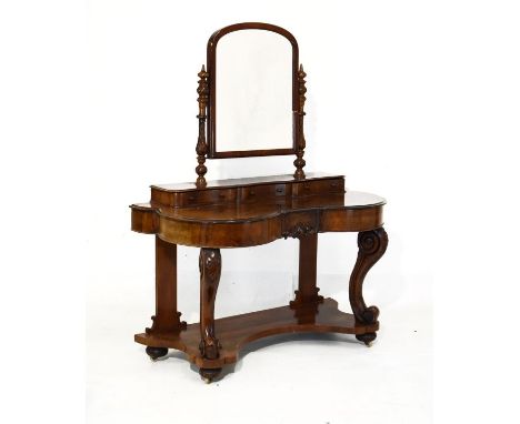 Victorian figured walnut and walnut Duchess dressing table, the raised back with a mahogany framed swing mirror on turned and