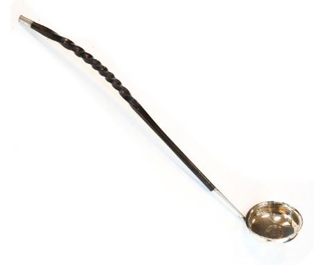 George III unmarked white metal  toddy ladle having a typical twist handle   Condition: 