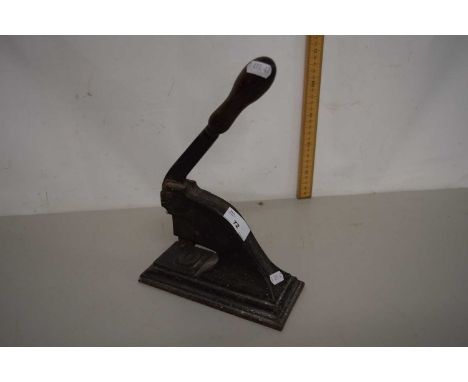 A vintage desk embosser