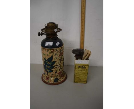 Ceramic based oil lamp together with a vintage vaporiser