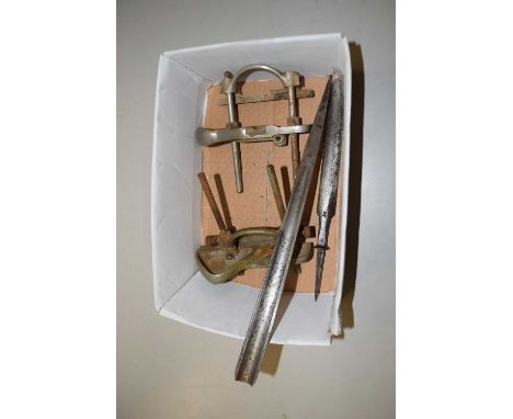A box of various wood working tools