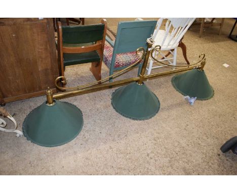 A brass framed triple ceiling light possibly from a snooker table, 170cm long