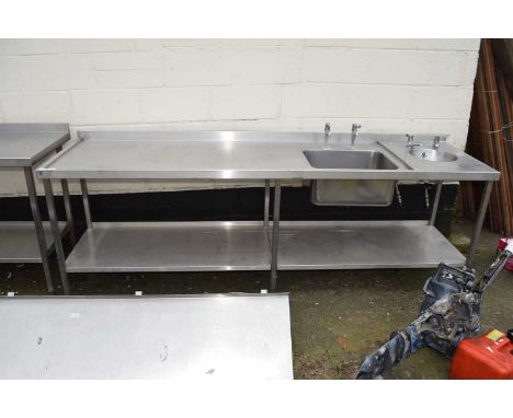 A steel kitchen preparation table with sink and basin, 250cm wide