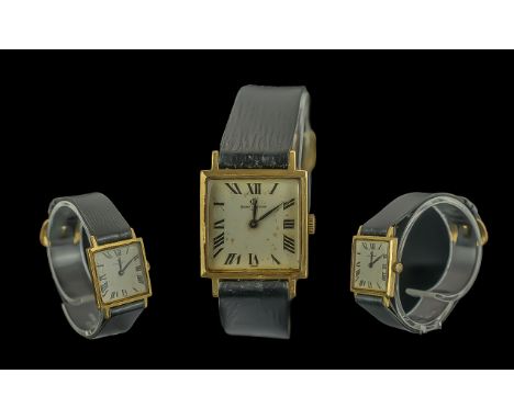 LAdies 18ct Gold Baume & Mercier Wristwatch, engraved back Buzz Buzz Buzz, manual wind ticking, not tested for accuracy.