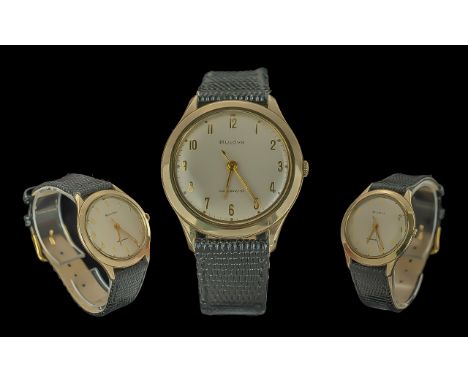 Bulova Gent's 1960's Mechanical Gold on Steel Wrist Watch.  Features Gold markers on cream dial, waterproof, seconds sweep. W