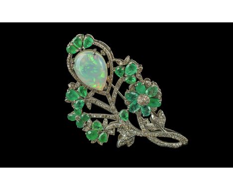 Foliate Bar Pin Brooch Set with a cabochon pear shaped opal, pear-shaped emeralds and diamonds, in silver, Opal 7.88ct. Emera